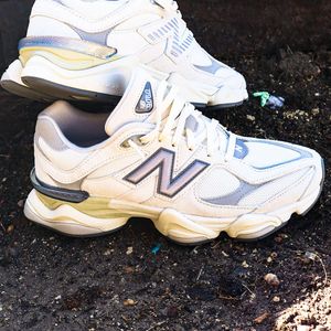 Pair of white running shoes.